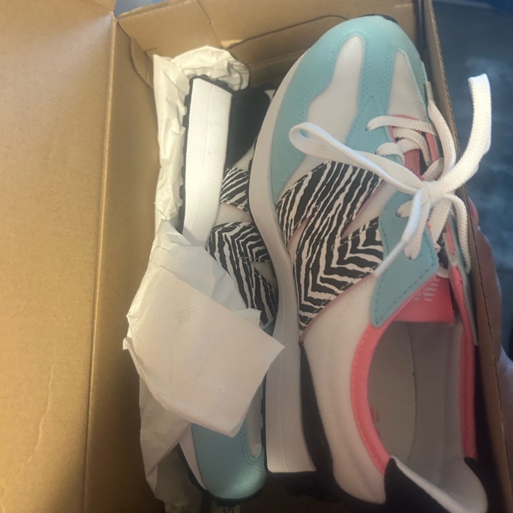 Stylish Zebra Print Sneakers with Blue Accents